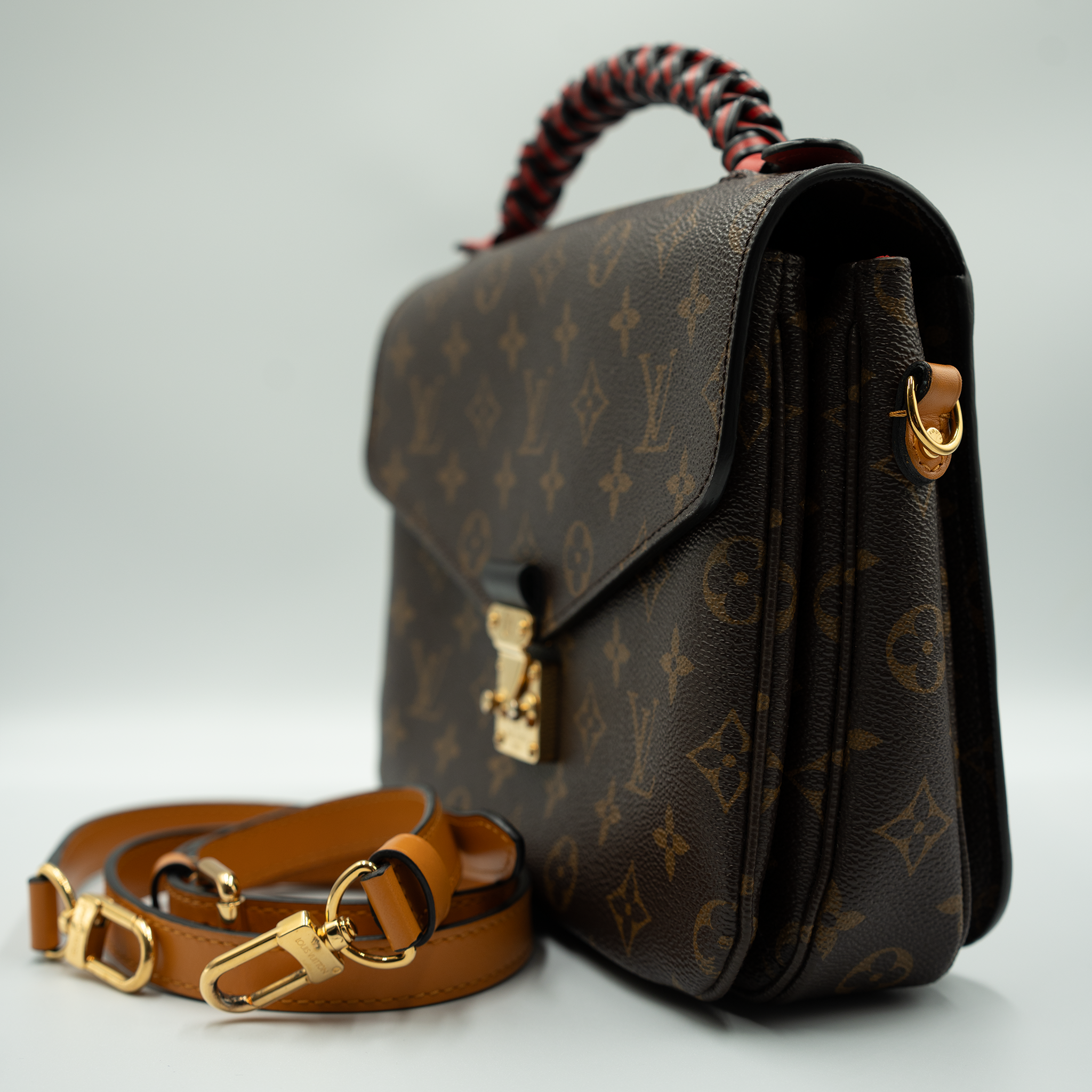Louis Vuitton Monogram Braided Pochette Metis